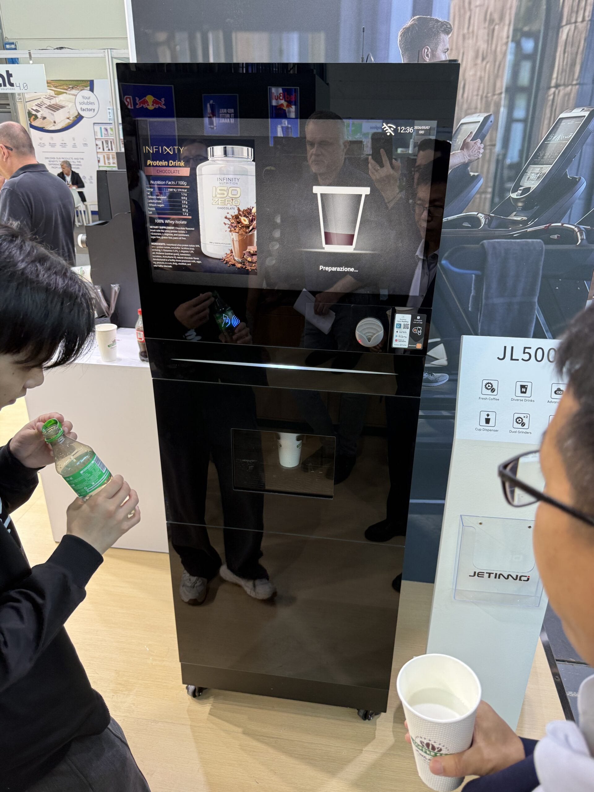 Hopper and dosing system inside a protein shake vending machine holding bulk powder