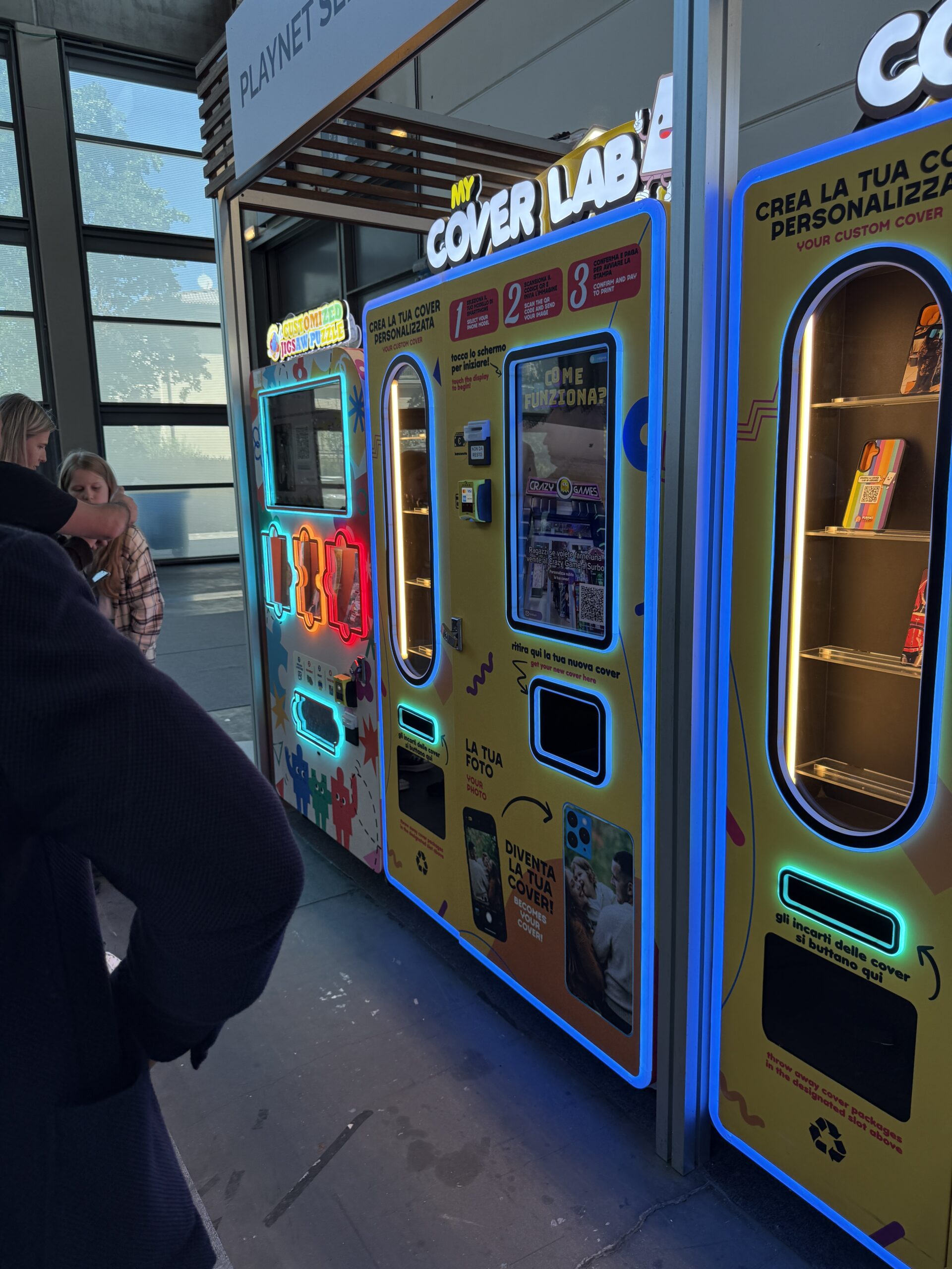 Bank of personalisation vending machines in a public venue