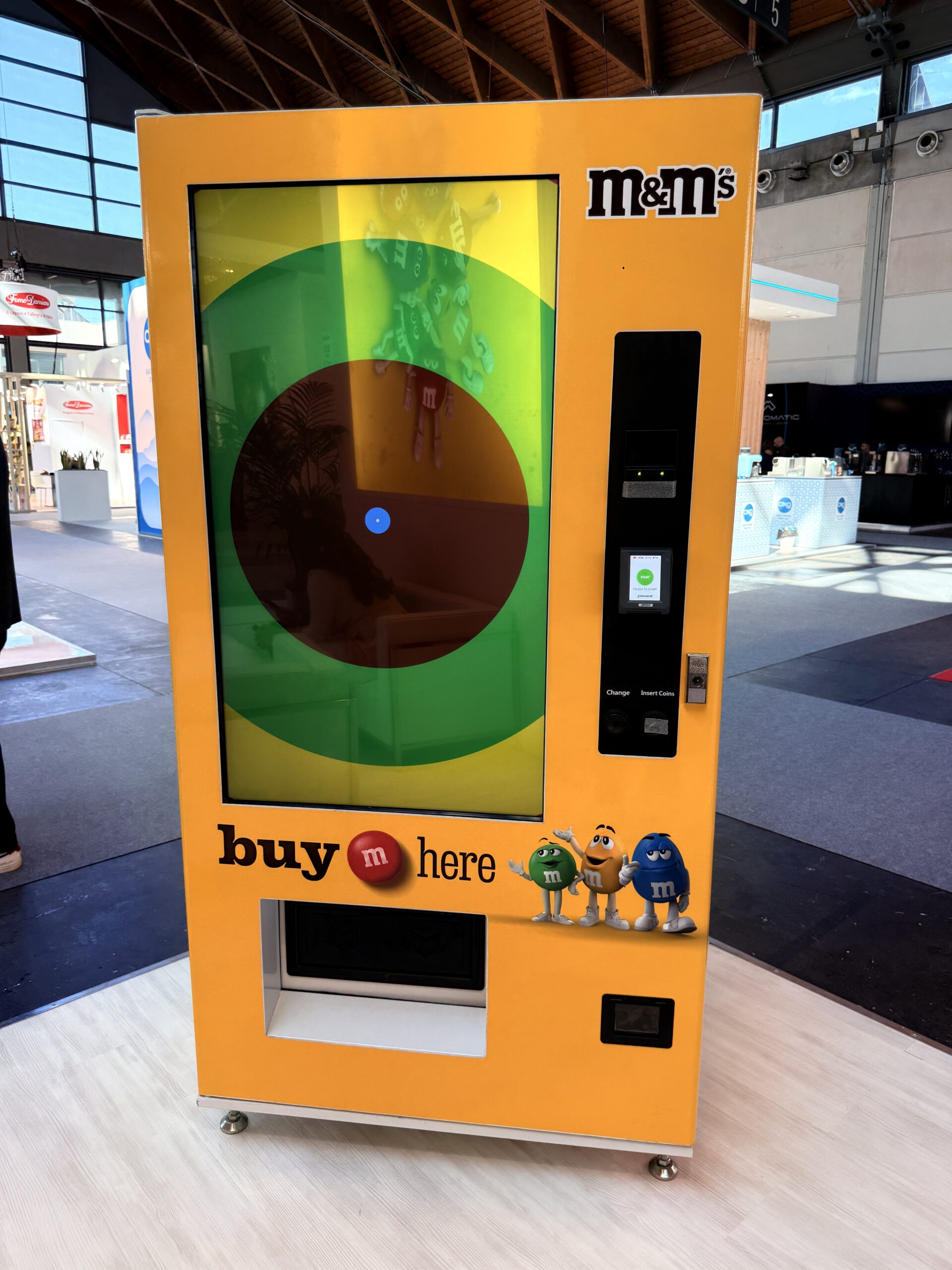 Fully branded custom vending machine installed in a commercial location