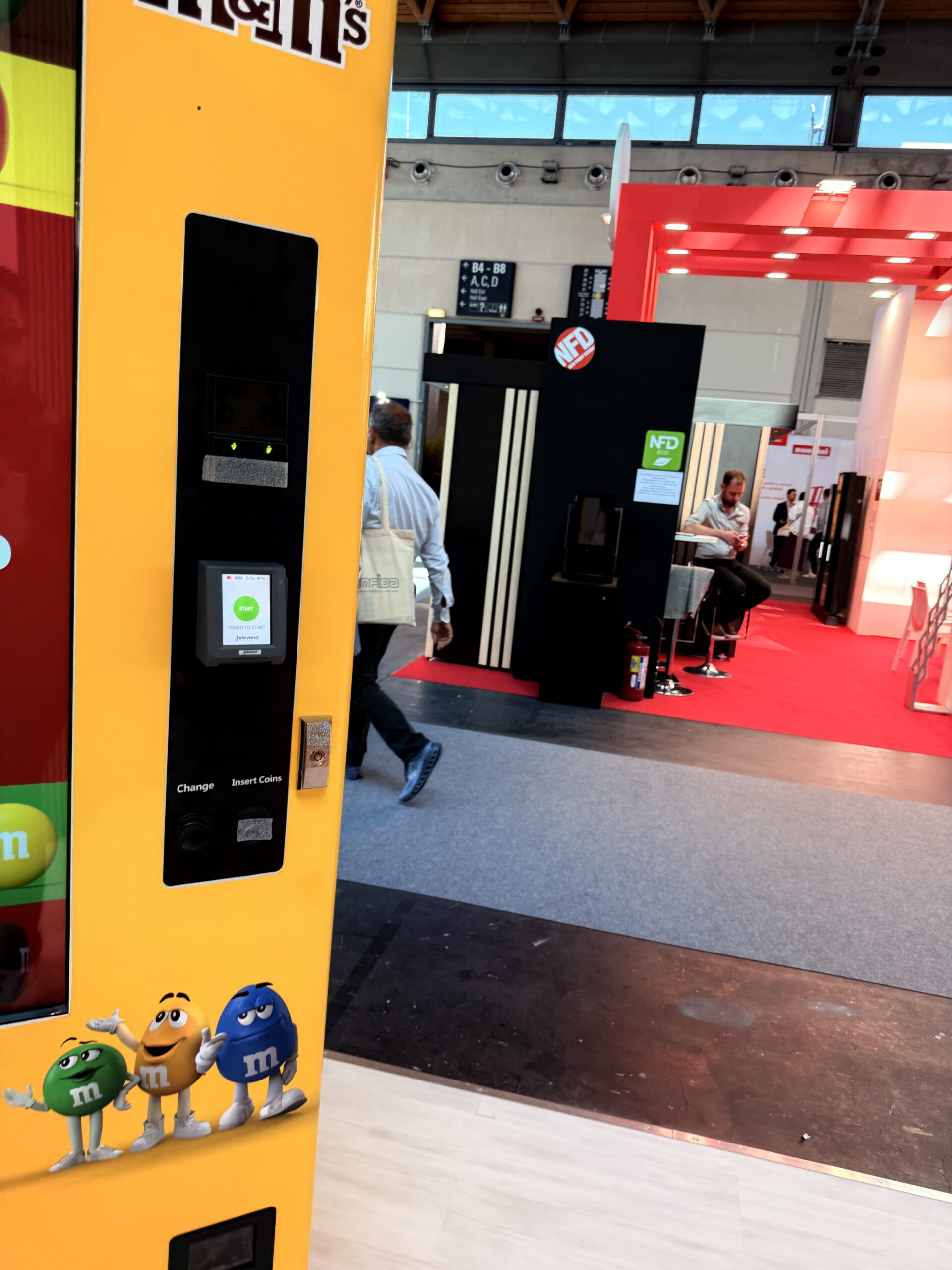 Custom branded vending machine showing graphics and lighting detail
